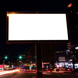 Bright digital billboard is shining at night